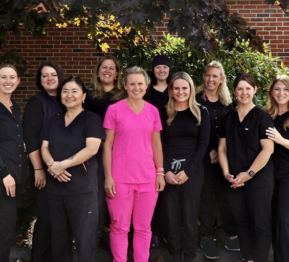 Smiling Roosevelt Dental team members in Windham